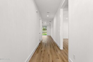 7021 N Lagoon Dr in Panama City, FL - Building Photo - Building Photo