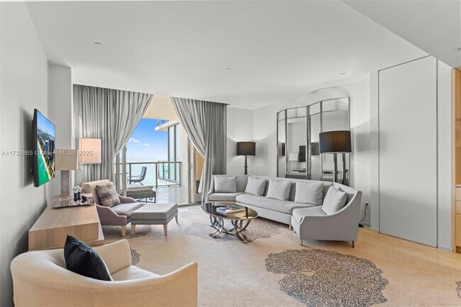 property at 9703 Collins Ave