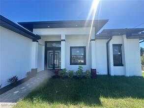402 Irving Ave in Lehigh Acres, FL - Building Photo - Building Photo
