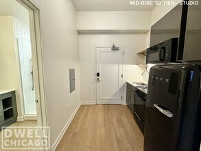 118 W Chicago Ave, Unit 1 in Chicago, IL - Foto de edificio - Building Photo