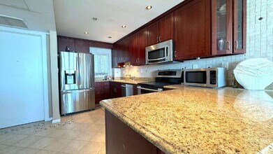 3601 S Atlantic Ave in Daytona Beach, FL - Building Photo - Building Photo