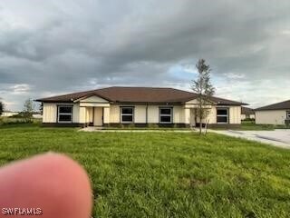 801 SW Raintree Blvd in La Belle, FL - Building Photo