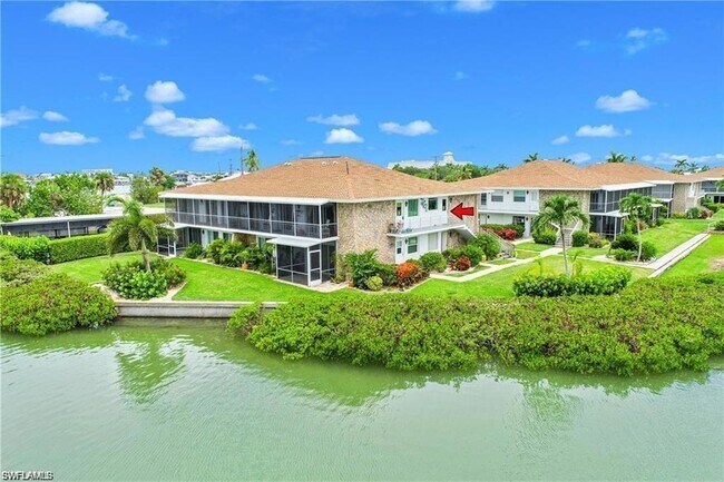 330 Kon Tiki Dr, Unit A2 & A8 in Naples, FL - Building Photo - Building Photo