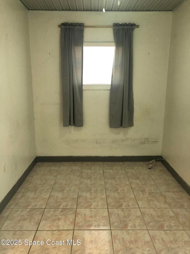 1403 S Miramar Ave-Unit -D in Indialantic, FL - Building Photo - Building Photo
