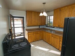 1395 N Harlan St in Lakewood, CO - Foto de edificio - Building Photo