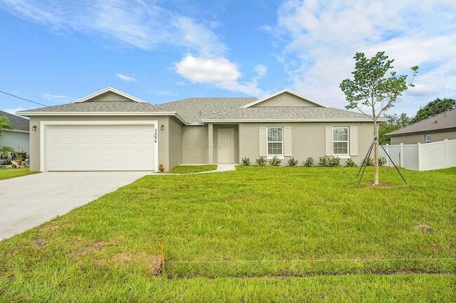 5884 NW Files Ct in Port St. Lucie, FL - Building Photo - Building Photo