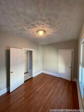 157 E Cottage St in Boston, MA - Foto de edificio - Building Photo