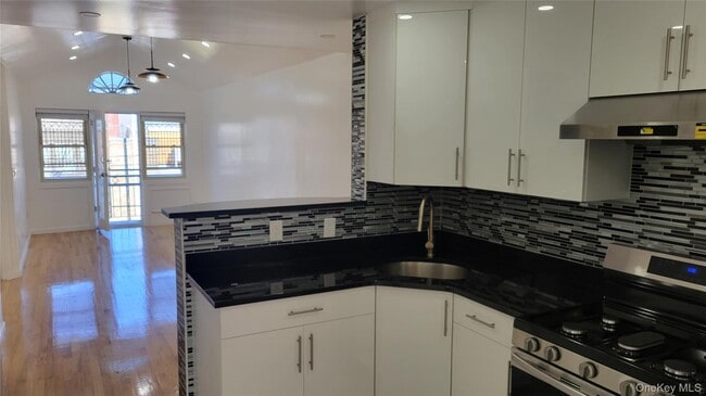 property at 31-16 60th St