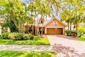 6310 NW 58th Way in Parkland, FL - Building Photo