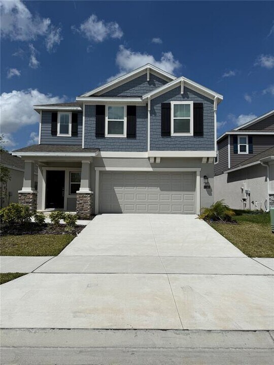 1160 Deepwater Cir in Eagle Lake, FL - Building Photo