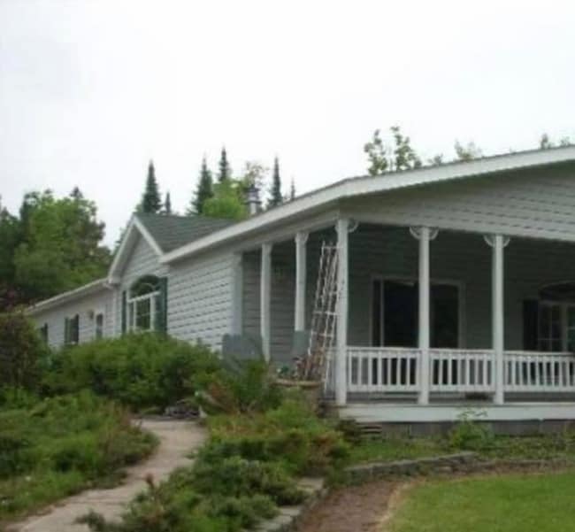 property at 8677 W Lake Rd