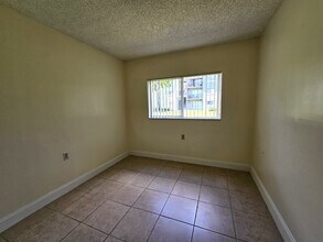 1215 Benoist Farms Rd in West Palm Beach, FL - Building Photo - Building Photo