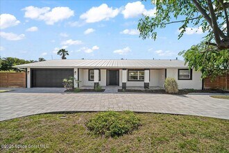 409 Magnolia Ave in Melbourne Beach, FL - Building Photo - Building Photo