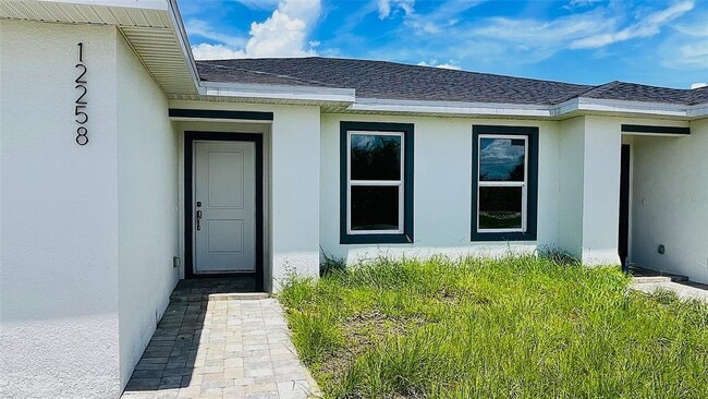 12258 Henley Ave in Port Charlotte, FL - Building Photo - Building Photo