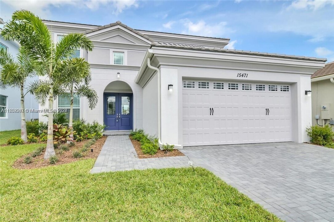 15471 Orchard Dr in Loxahatchee, FL - Building Photo