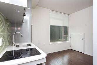 To view a virtual tour of this property in Seattle, WA - Building Photo - Interior Photo
