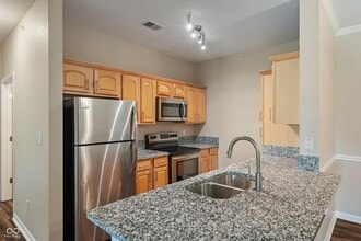 12833 Tradd St, Unit 3A in Carmel, IN - Building Photo - Building Photo