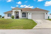 1049 NW 38th Pl in Cape Coral, FL - Foto de edificio - Building Photo