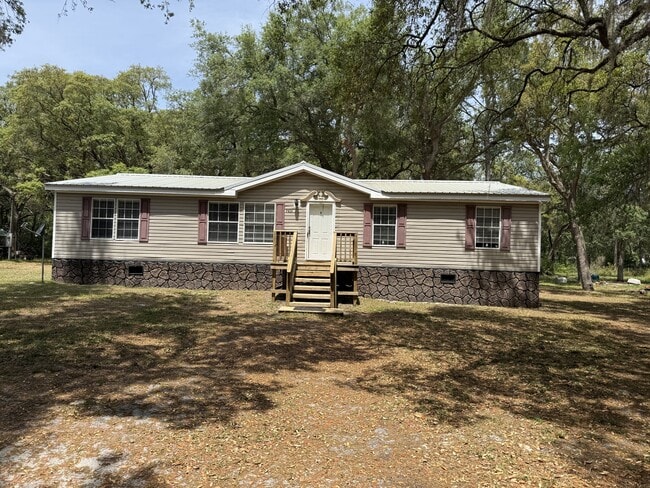 property at 7831 NW 166th St