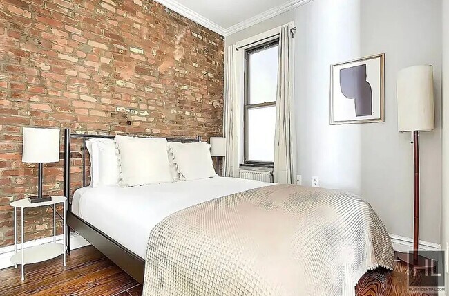 Stanton Street, Unit 6G in New York, NY - Building Photo - Building Photo