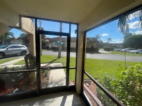 7233 Golf Colony Ct in Greenacres, FL - Building Photo - Building Photo