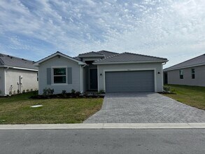 7773 Lakes Edge Ln in Port Charlotte, FL - Building Photo - Building Photo