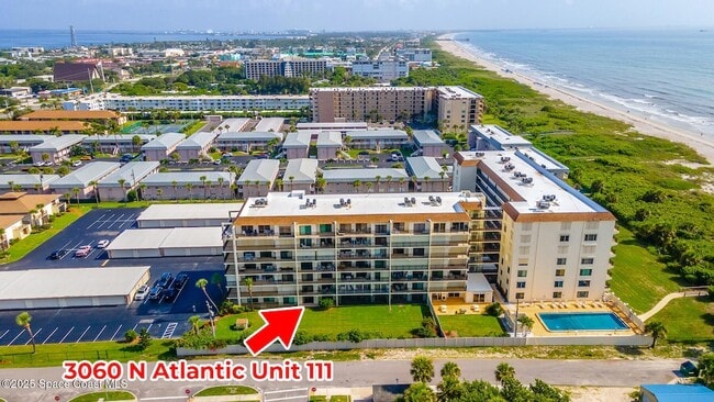 3060 N Atlantic Ave, Unit 111 in Cocoa Beach, FL - Building Photo - Building Photo