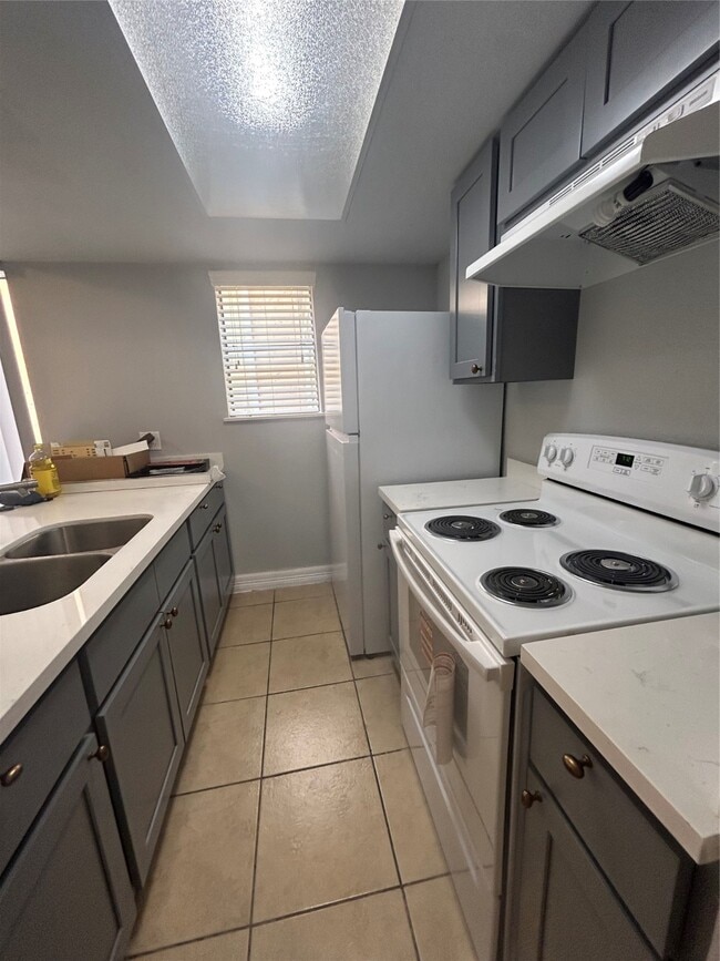 property at 11411 Harwin Dr.
