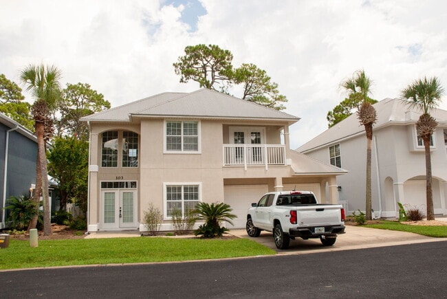7009 N Lagoon Dr in Panama City Beach, FL - Building Photo - Building Photo