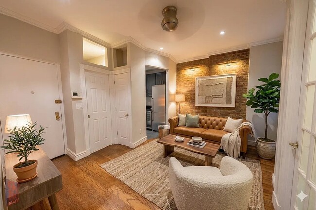 property at 230 E 32nd St