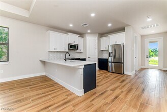 4161 NW 39th Pl in Cape Coral, FL - Building Photo - Building Photo