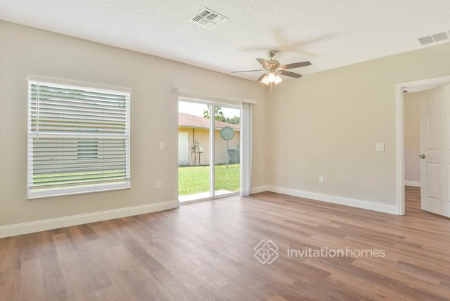 414 Long Dr in Poinciana, FL - Foto de edificio - Building Photo