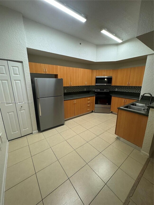 2851 Riverside Dr-Unit -103-N in Coral Springs, FL - Building Photo - Building Photo