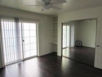 Master bedroom with 1/2 bath - American Village Apartamentos in Tucson, Arizona