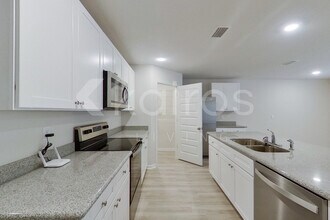 4734 Malay Cir in Pace, FL - Foto de edificio - Building Photo