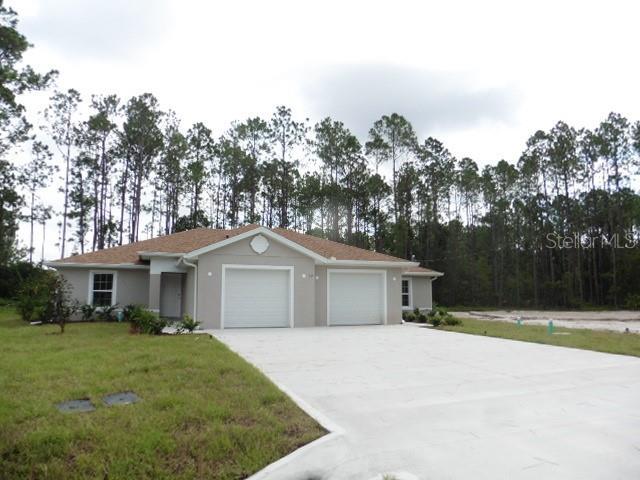 32 Regency Dr in Palm Coast, FL - Building Photo - Building Photo