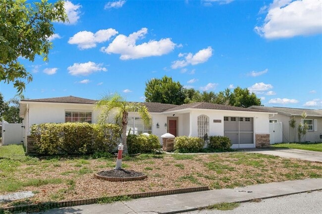 7114 Parrot Dr in Port Richey, FL - Building Photo - Building Photo