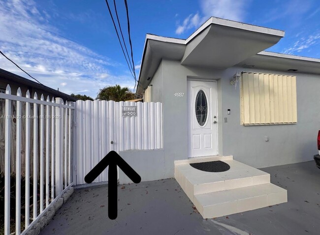 property at 4887 NW 4th St