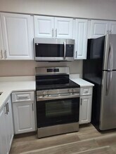 2222 N Cypress Bend Dr, Unit #202 in Pompano Beach, FL - Building Photo - Building Photo