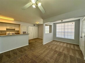 1610 Columbia Arms Cir, Unit 131 in Kissimmee, FL - Foto de edificio - Building Photo