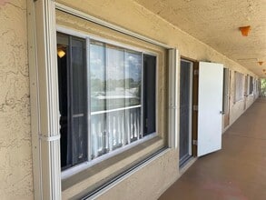 100 Village Green Cir E in Palm Springs, FL - Building Photo - Building Photo