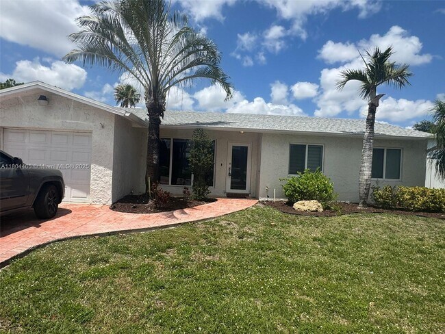 property at 9431 NW 10th St