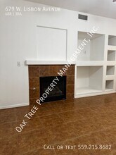 679 W Lisbon Ln in Clovis, CA - Building Photo - Building Photo