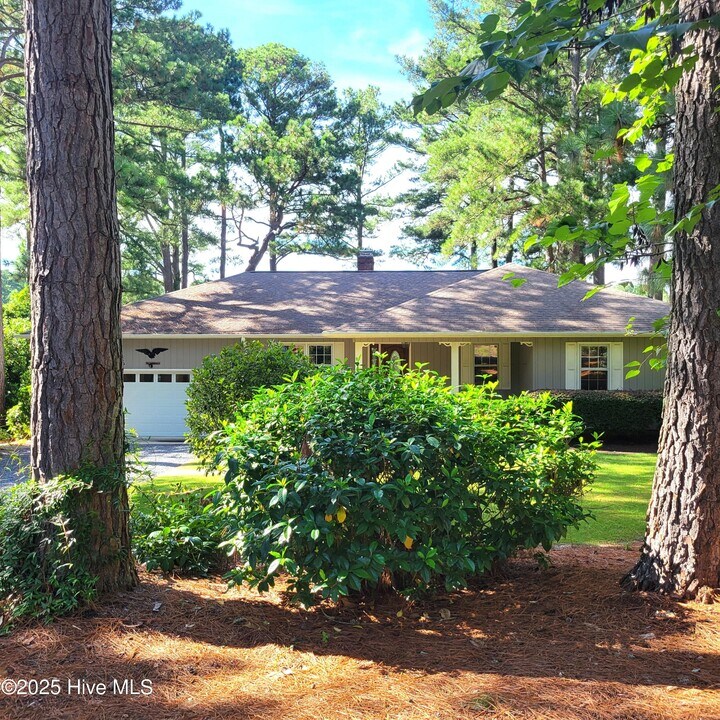 62 Pine Ridge Dr in Whispering Pines, NC - Building Photo