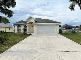1835 SW Dalmatian Ave in Port St. Lucie, FL - Building Photo