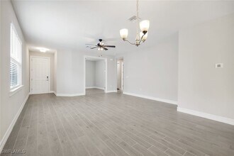 16717 Seasons Coast Dr in Bonita Springs, FL - Building Photo - Building Photo