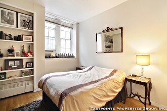 29 King St-Unit -1G in New York, NY - Building Photo - Building Photo