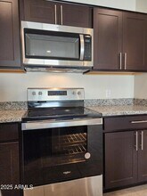 1058 W Chimes Tower Dr in Casa Grande, AZ - Building Photo - Building Photo
