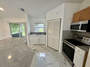 2410 George Ave S in Lehigh Acres, FL - Building Photo - Building Photo