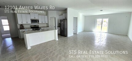 12101 Amber Waves Rd in Lehigh Acres, FL - Building Photo - Building Photo